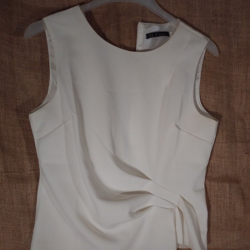 Sleeveless Asymetric White Blouse by H.Yhome.